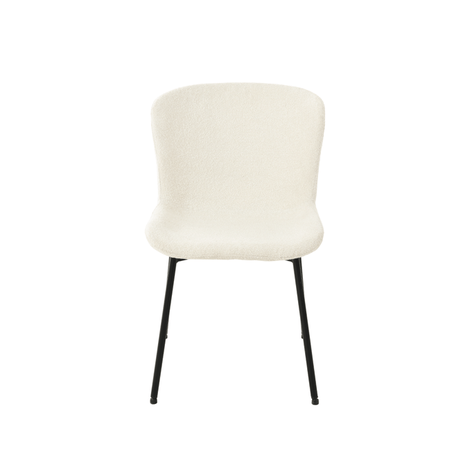 Weißer Stoff-Esszimmerstuhl mit schwarzen Beinen.